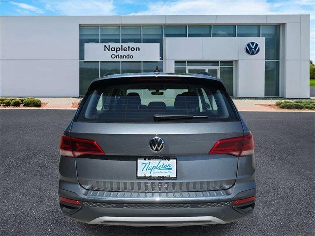 used 2023 Volkswagen Taos car, priced at $18,000