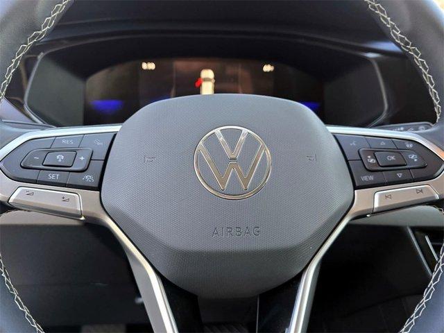 used 2024 Volkswagen Taos car, priced at $27,462