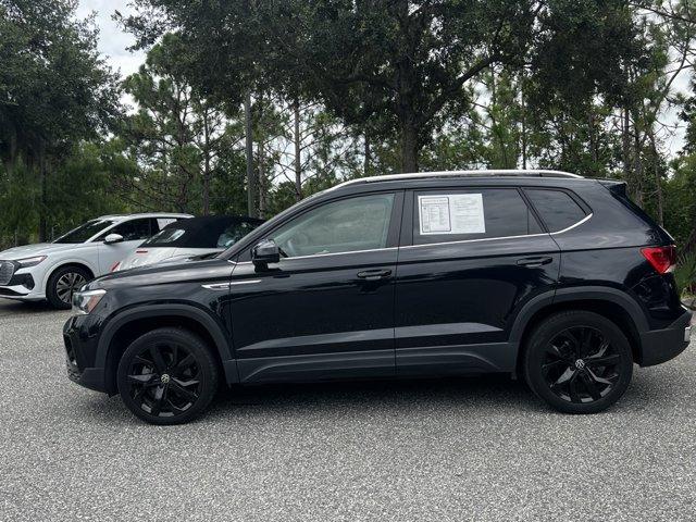used 2023 Volkswagen Taos car, priced at $22,300