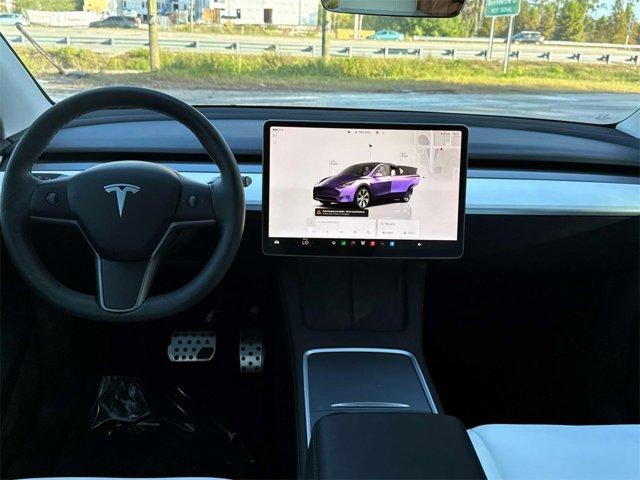 used 2023 Tesla Model Y car, priced at $32,530