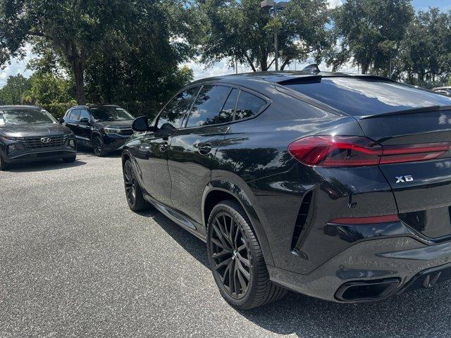 used 2022 BMW X6 car, priced at $56,900