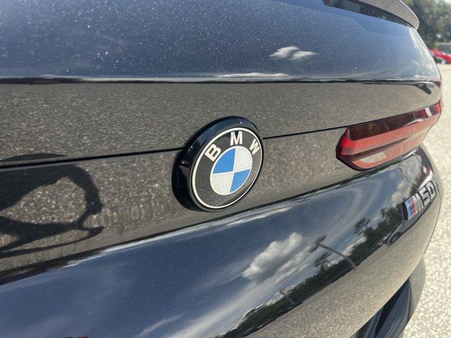 used 2022 BMW X6 car, priced at $56,900