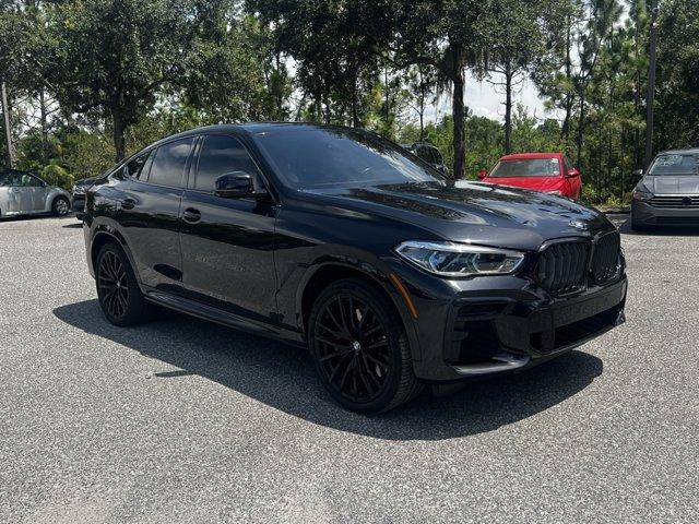 used 2022 BMW X6 car, priced at $56,900