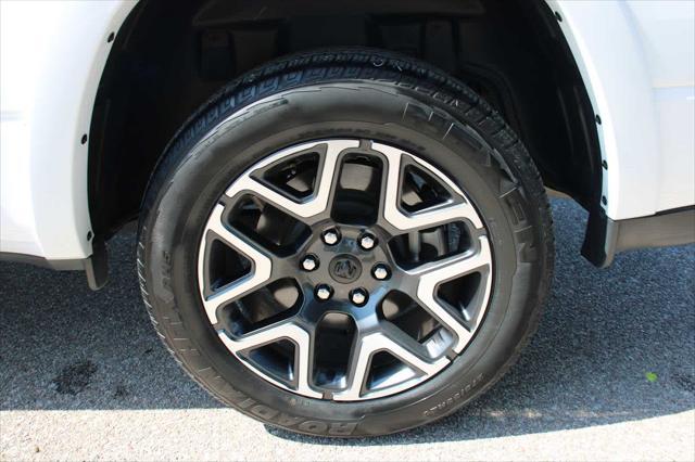used 2025 Ram 1500 car, priced at $55,555
