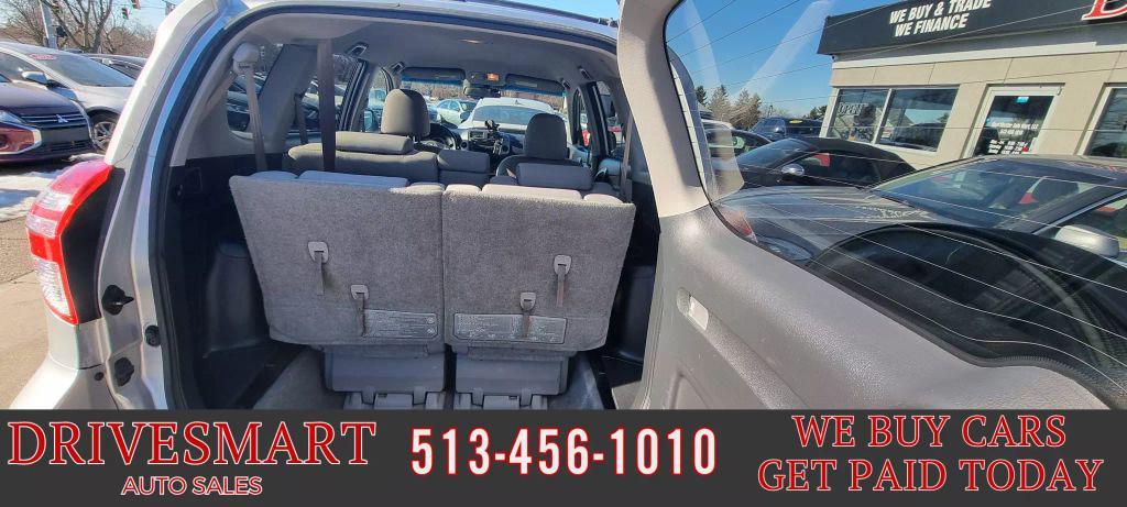 used 2010 Toyota RAV4 car, priced at $9,999