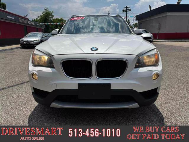 used 2013 BMW X1 car, priced at $9,899