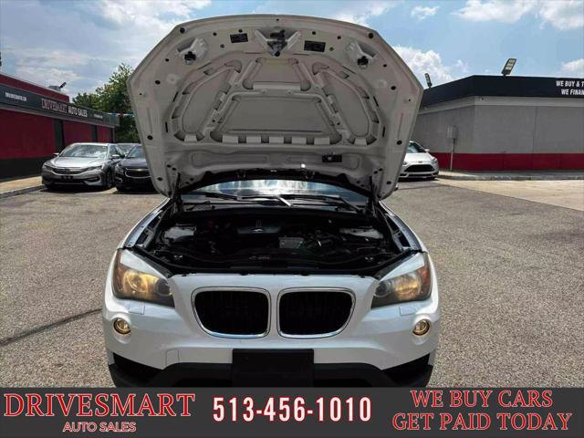 used 2013 BMW X1 car, priced at $9,899