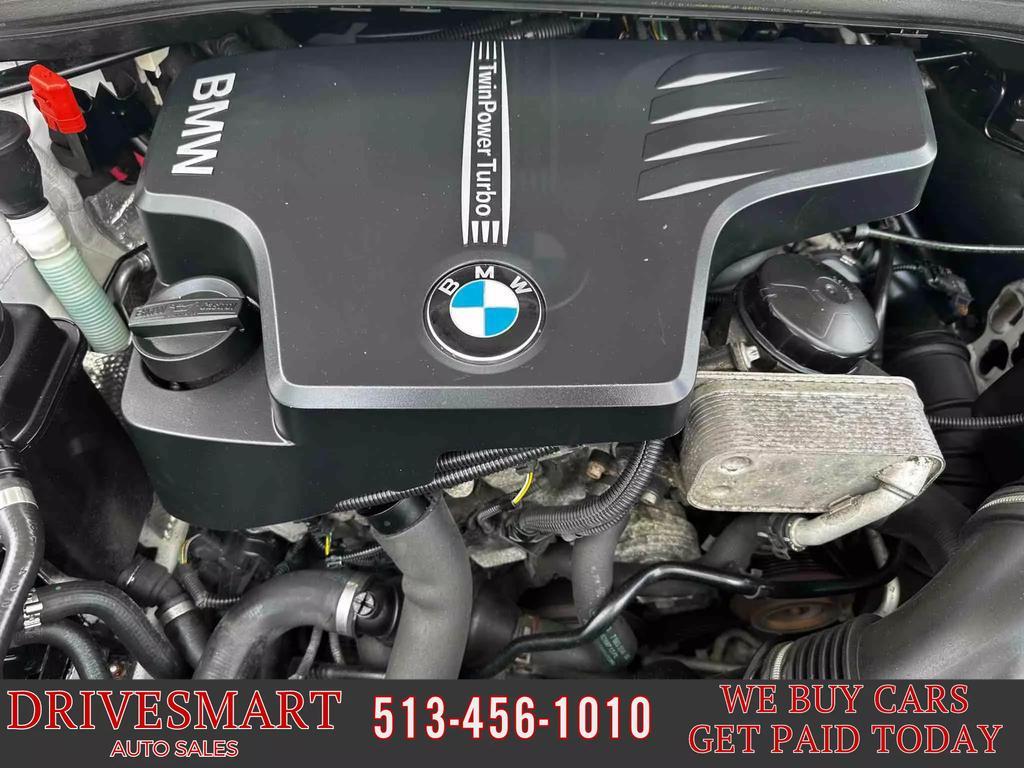 used 2013 BMW X1 car, priced at $9,899