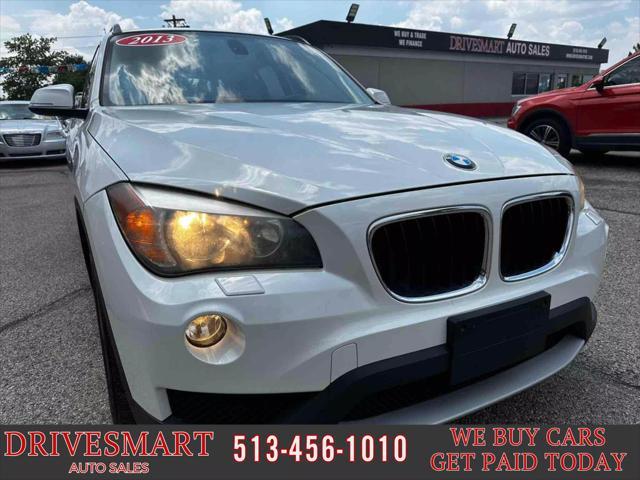 used 2013 BMW X1 car, priced at $9,899