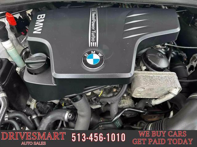 used 2013 BMW X1 car, priced at $9,899