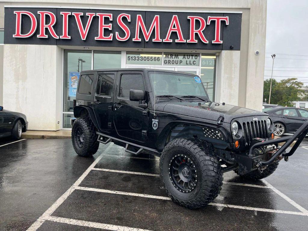 used 2011 Jeep Wrangler Unlimited car, priced at $14,799