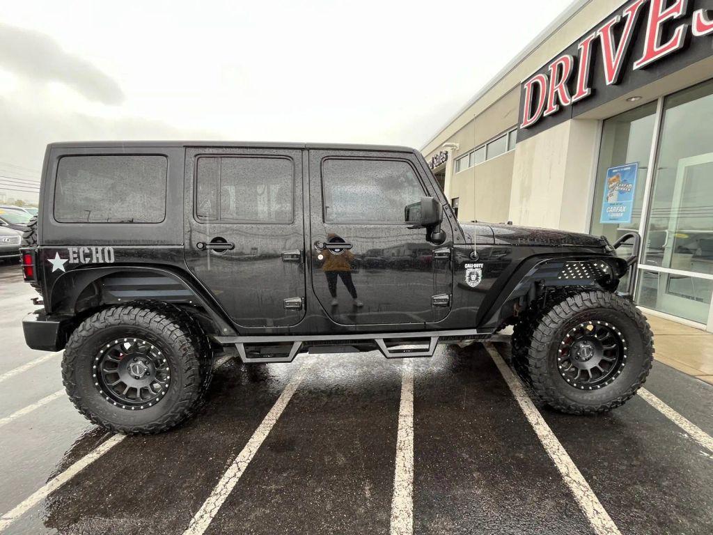 used 2011 Jeep Wrangler Unlimited car, priced at $14,799