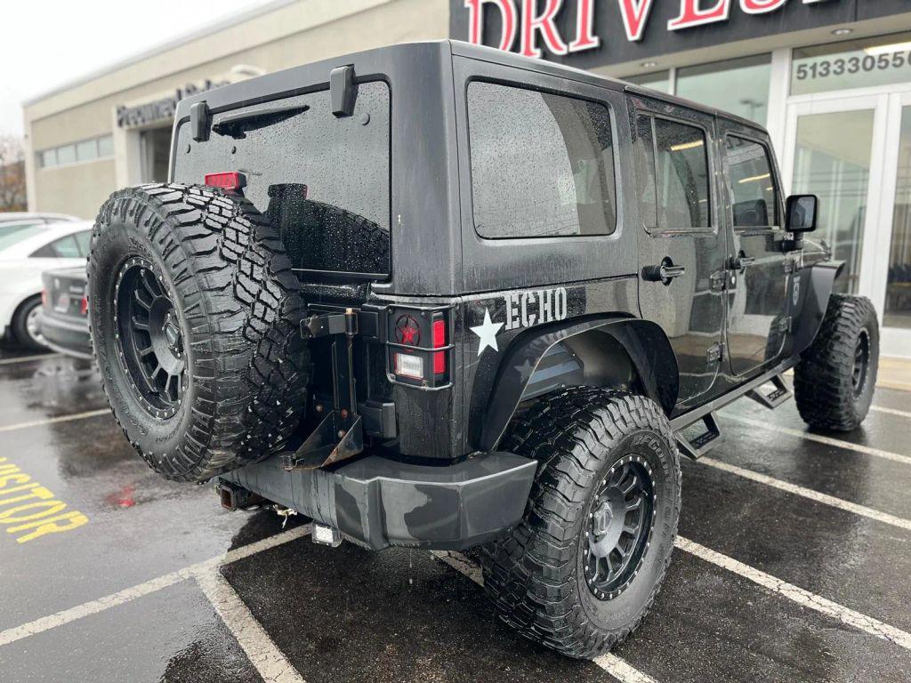 used 2011 Jeep Wrangler Unlimited car, priced at $14,799