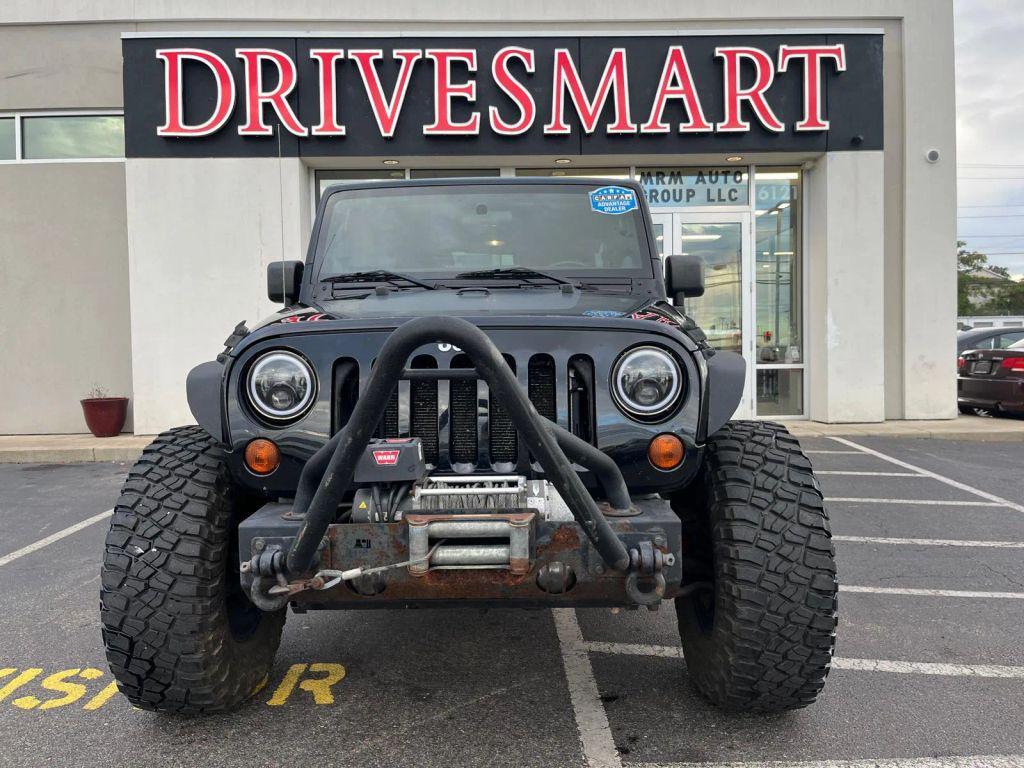 used 2011 Jeep Wrangler Unlimited car, priced at $14,799
