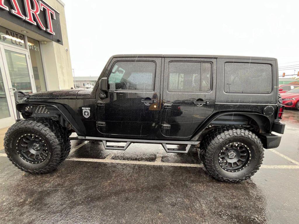 used 2011 Jeep Wrangler Unlimited car, priced at $14,799
