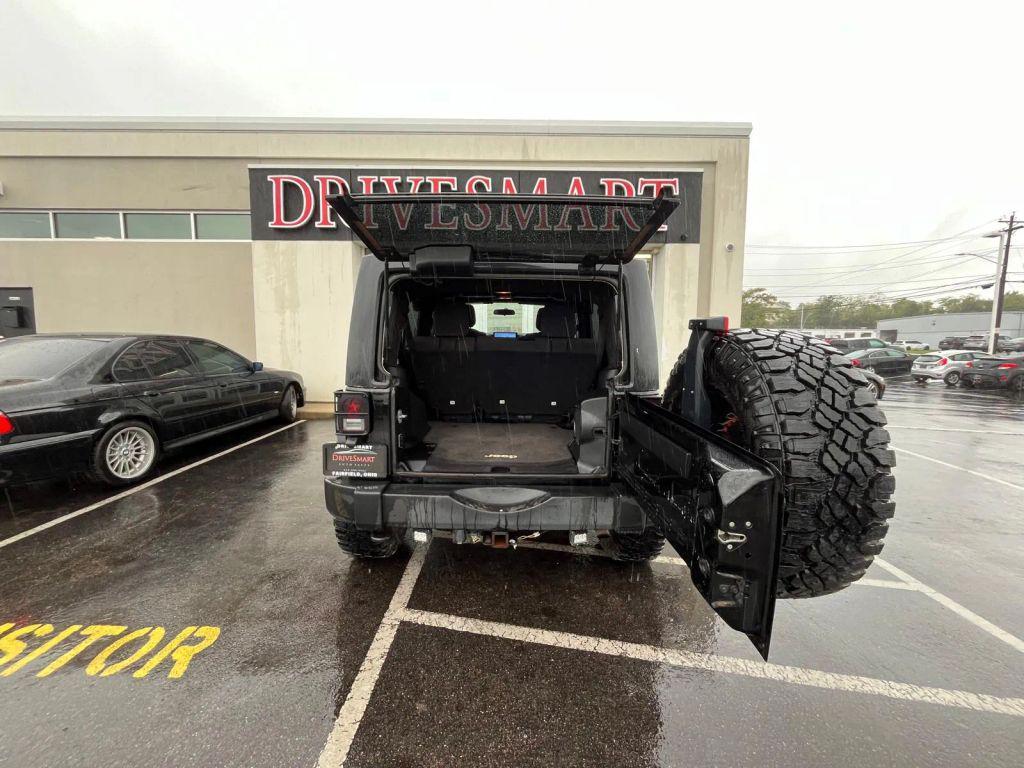 used 2011 Jeep Wrangler Unlimited car, priced at $14,799