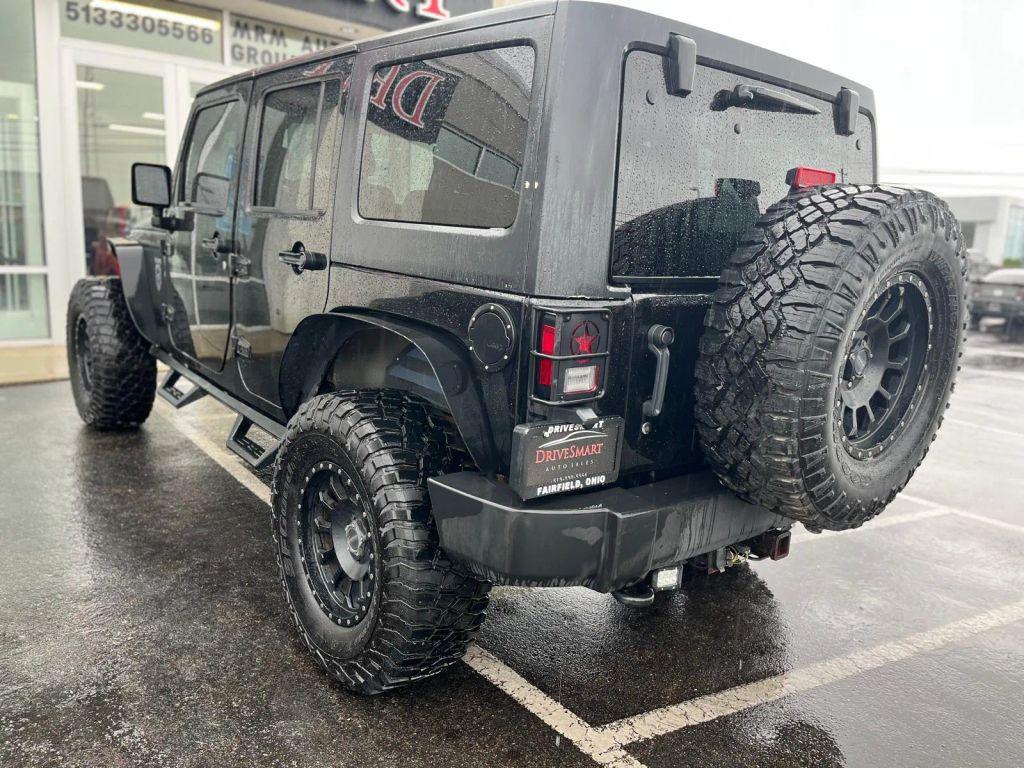 used 2011 Jeep Wrangler Unlimited car, priced at $14,799