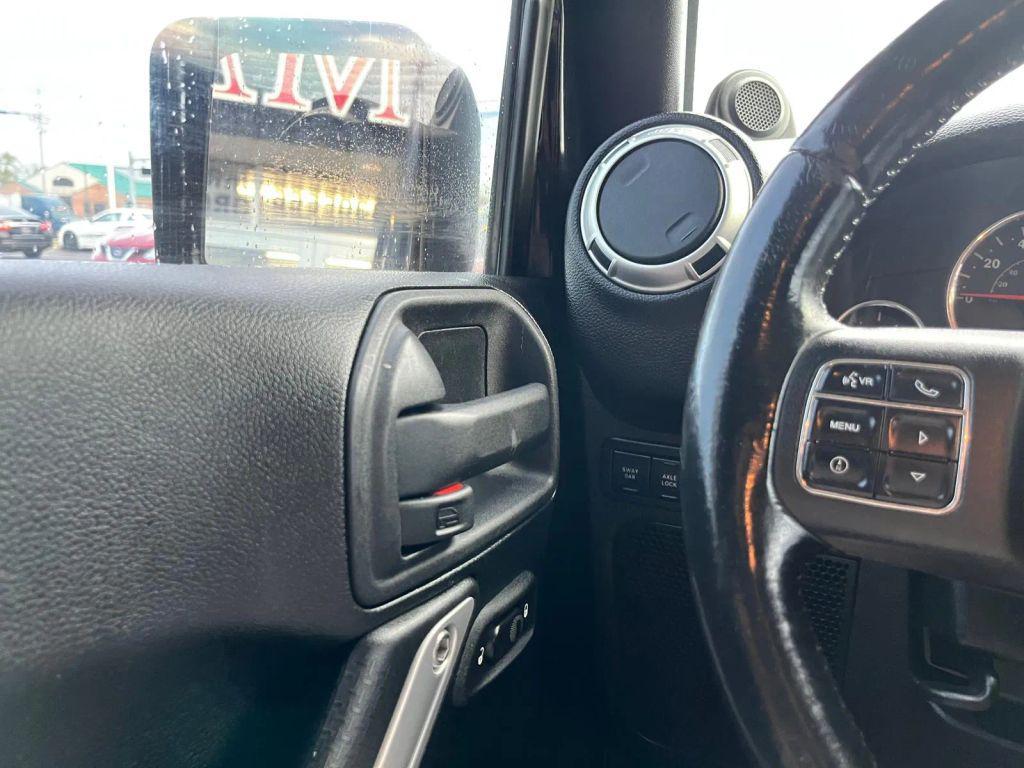 used 2011 Jeep Wrangler Unlimited car, priced at $14,799