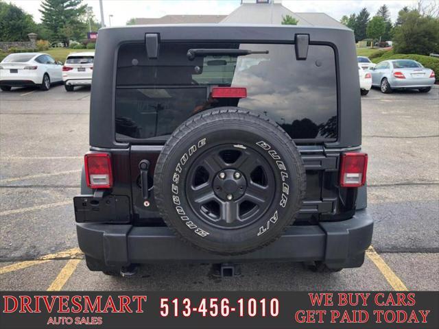 used 2015 Jeep Wrangler Unlimited car, priced at $19,999