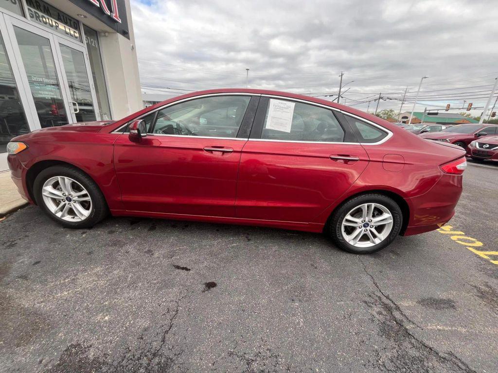 used 2014 Ford Fusion car, priced at $7,999