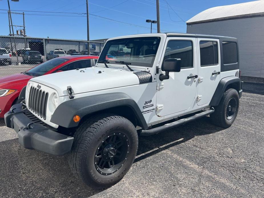 used 2015 Jeep Wrangler Unlimited car, priced at $21,556