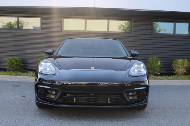 used 2023 Porsche Panamera e-Hybrid car, priced at $102,995