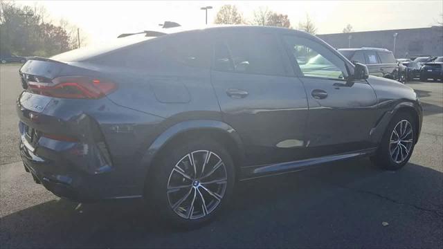 used 2022 BMW X6 car, priced at $51,303