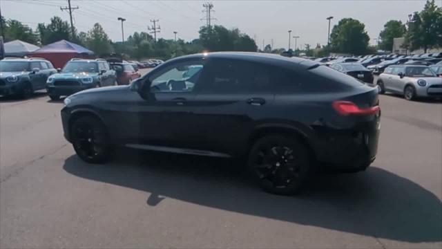 used 2025 BMW X4 car, priced at $62,102