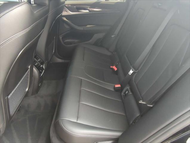 used 2025 BMW X4 car, priced at $62,102