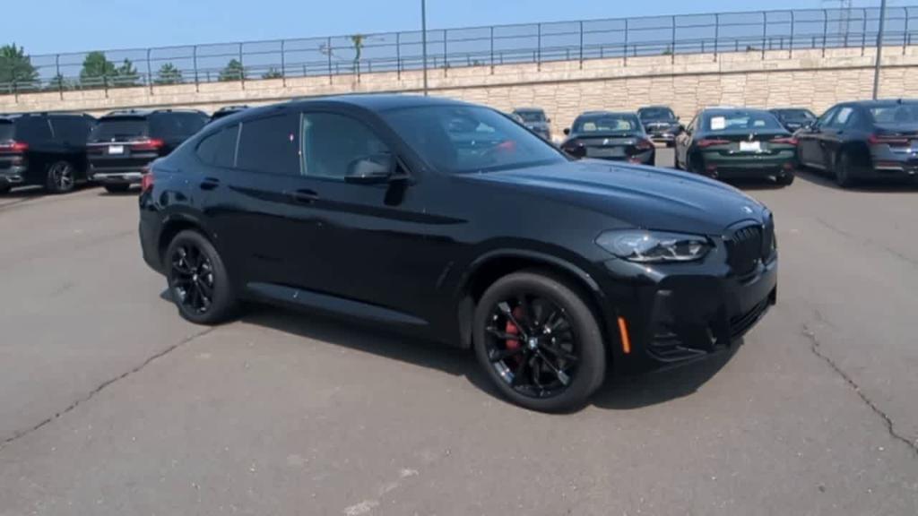 used 2025 BMW X4 car, priced at $66,495