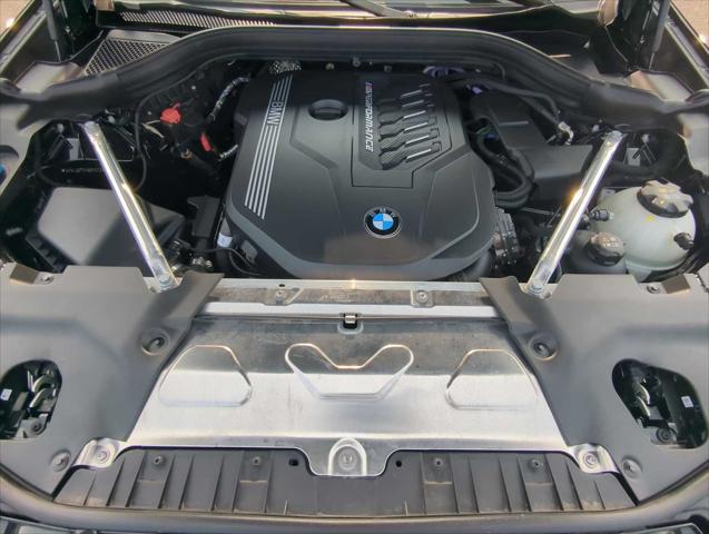 used 2025 BMW X4 car, priced at $62,102