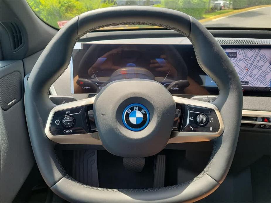 new 2024 BMW iX car, priced at $95,095