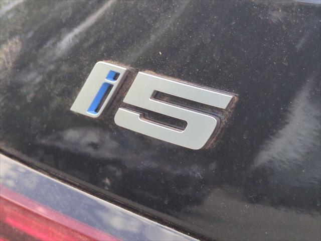 new 2025 BMW i5 car, priced at $93,925