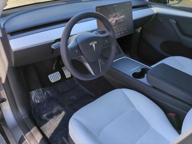 used 2024 Tesla Model Y car, priced at $38,945