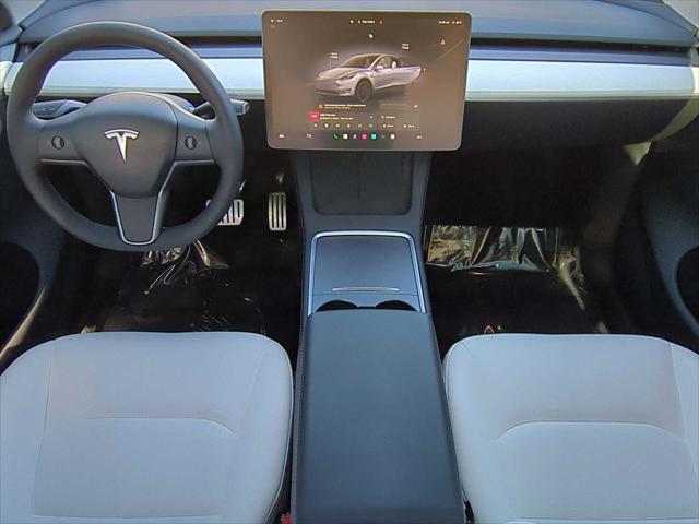 used 2024 Tesla Model Y car, priced at $38,945