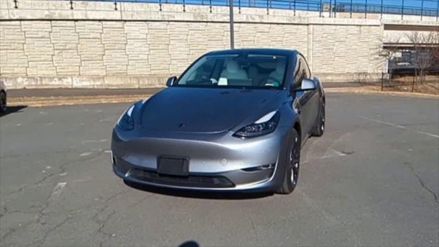 used 2024 Tesla Model Y car, priced at $38,945