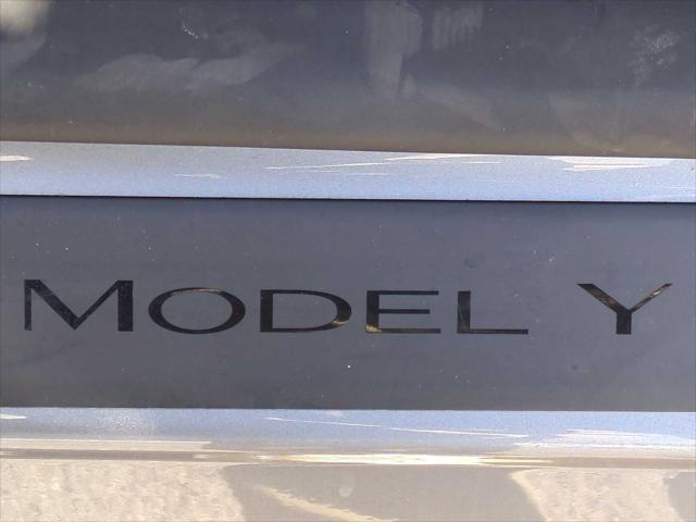 used 2024 Tesla Model Y car, priced at $38,945