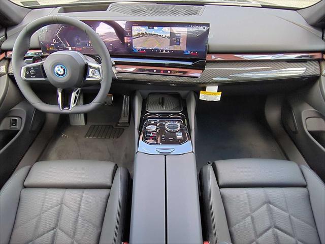 new 2026 BMW 550e car, priced at $85,925
