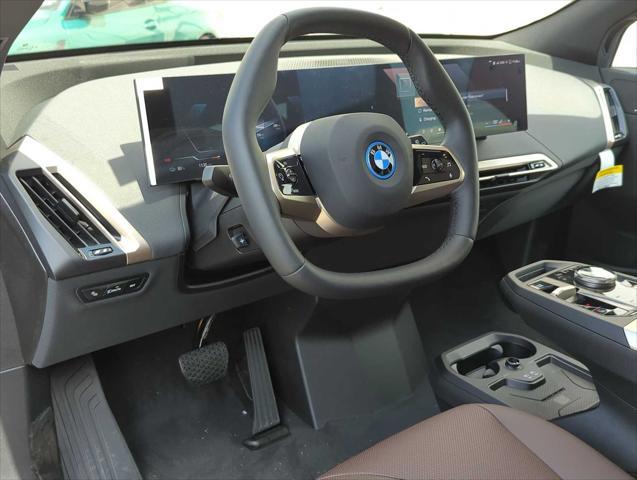 new 2025 BMW iX car, priced at $99,275