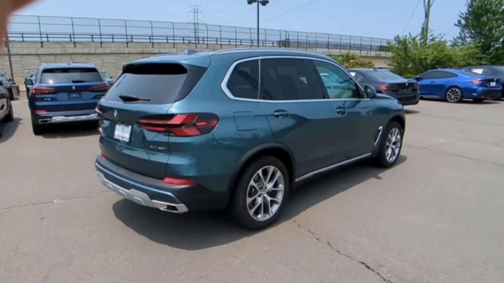used 2025 BMW X5 car, priced at $74,495
