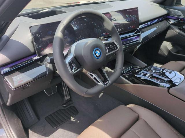 new 2026 BMW 550e car, priced at $81,825