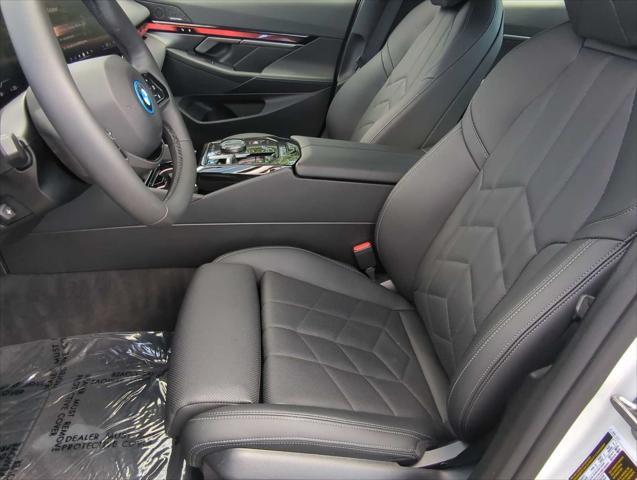 used 2024 BMW i5 car, priced at $52,295