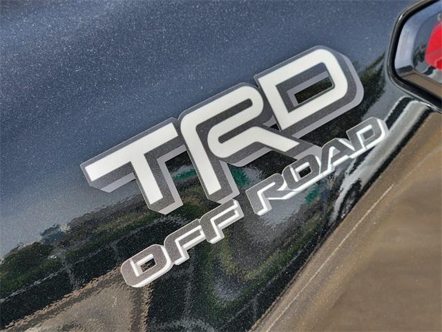 used 2024 Toyota Tacoma car, priced at $49,233