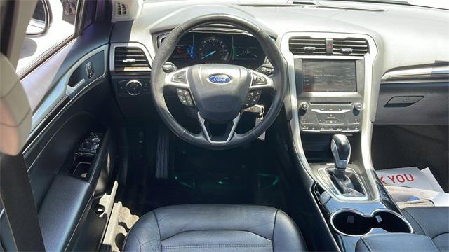 used 2014 Ford Fusion Energi car, priced at $5,994