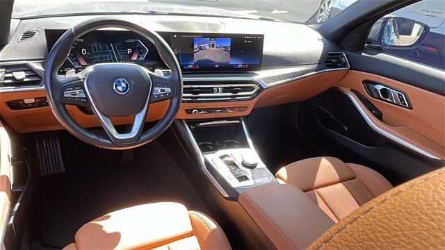 used 2023 BMW 330e car, priced at $31,987