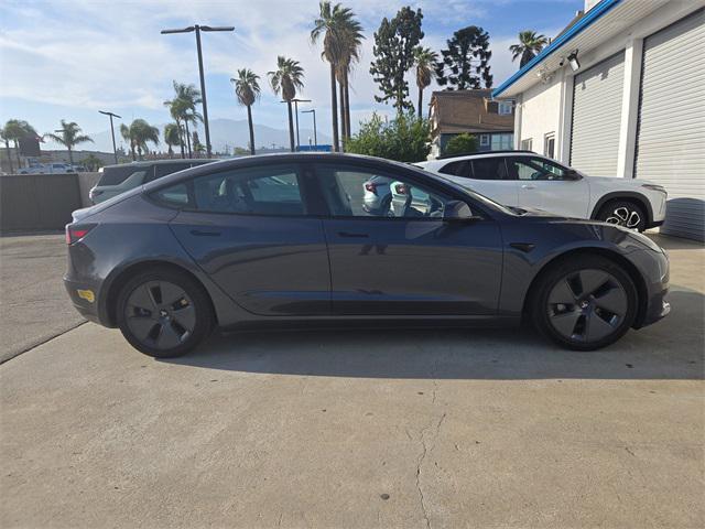 used 2022 Tesla Model 3 car, priced at $20,599