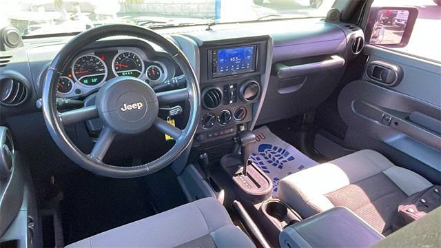 used 2010 Jeep Wrangler Unlimited car, priced at $16,647