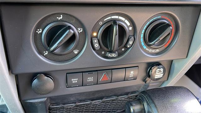 used 2010 Jeep Wrangler Unlimited car, priced at $16,647