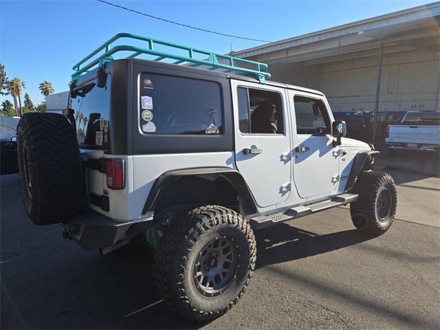 used 2016 Jeep Wrangler Unlimited car, priced at $24,231