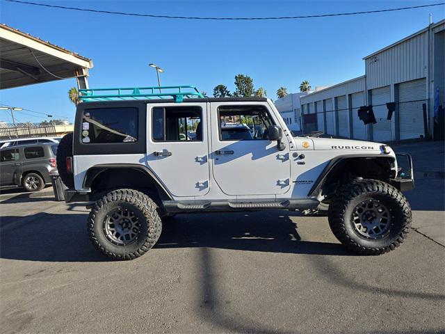 used 2016 Jeep Wrangler Unlimited car, priced at $24,231